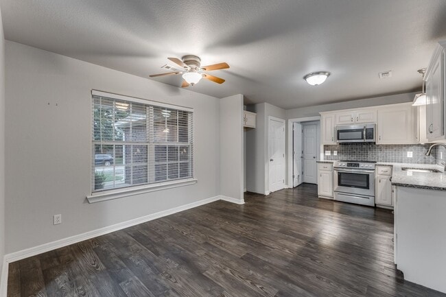 Building Photo - Charming 3-Bedroom Home with Fireplace & A...