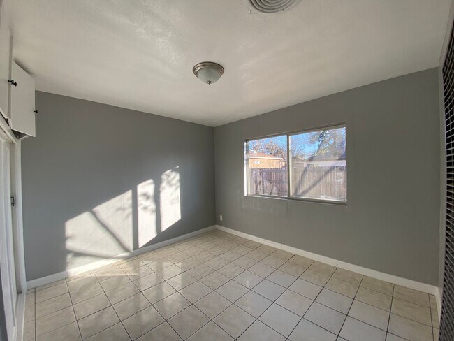 Building Photo - Hard to Find 1 BD 1 BA House with a 2 car garage and it's own yard.