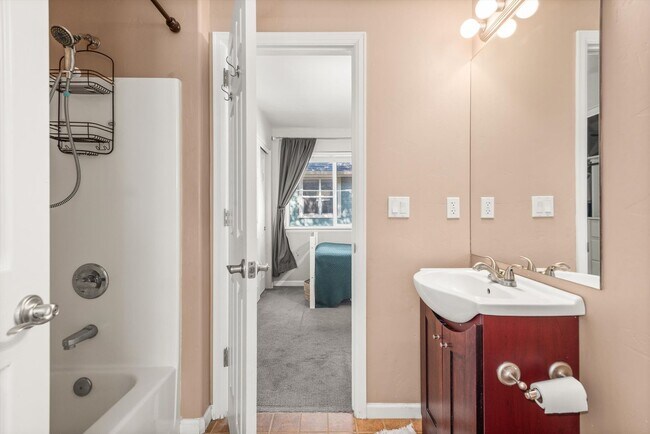Building Photo - Prime Location | Spacious 4BD Home with El...