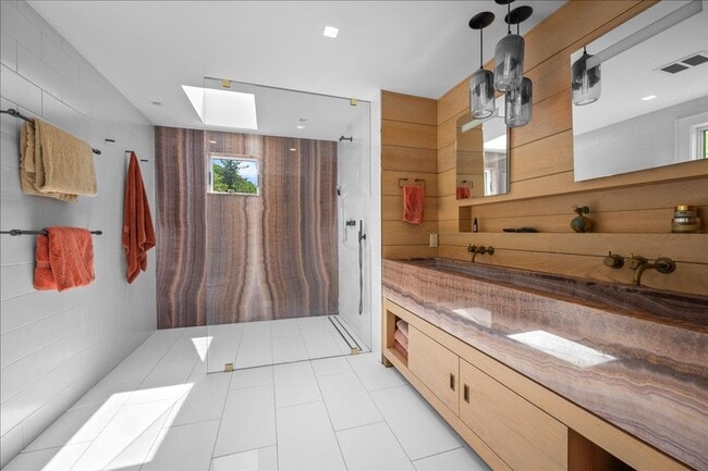Building Photo - Stunning Updated Home with Private Pond Views in Chappaqua
