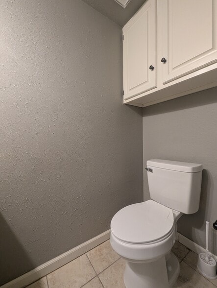 Powder room toilet - 14429 N Pennsylvania Ave