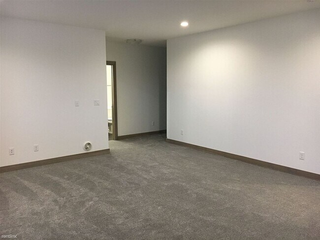 Building Photo - Spacious 4 bedroom/3 bath home with finished lower level and attached 2 car garage