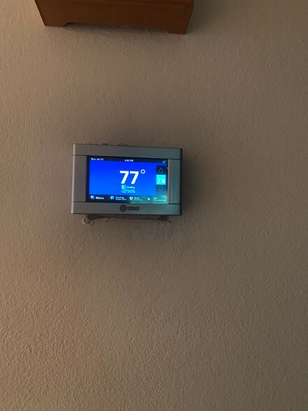 two separate digital thermostats - 1207 E Loyola Dr
