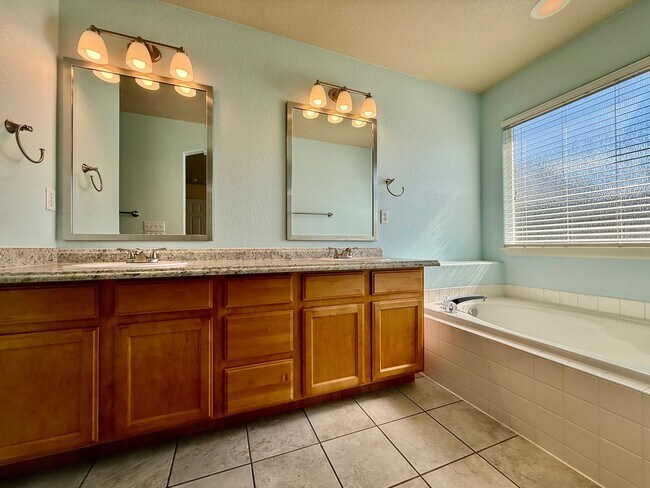 Building Photo - Spacious 4-Bedroom Home with Main level Living