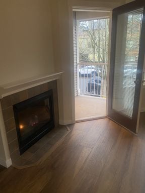 Building Photo - LIKE NEW three bedroom with fantastic updates, one car garage and private newly fenced front patio!