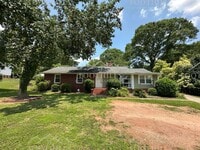 Building Photo - Live Steps Away from Anderson University –...