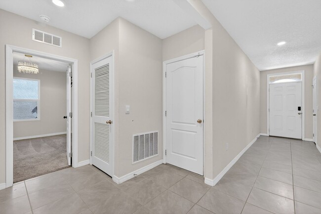 Building Photo - Available Now in Tavares | 2023 Built 4BR/2BA Home with 2-Car Garage