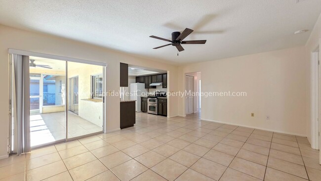 Building Photo - SPACIOUS SARASOTA HOME WITH LARGE FENCED YARD! MOVE IN READY! ALL TILE/ NEW LVP!