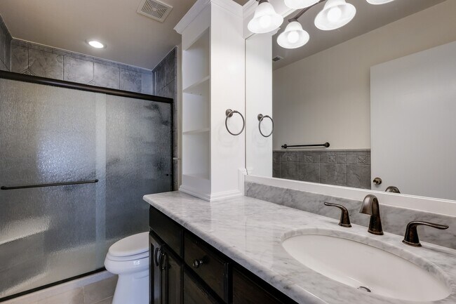 Building Photo - Modern Elegance: 3-Bedroom Townhome with Wood Flooring, Shaded Deck, and Inclusive Amenities