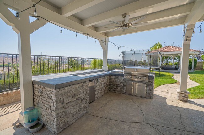 Building Photo - Spectacular 5-Bedroom Home with Pool, RV P...