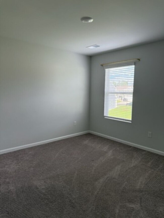Building Photo - 7980 Uplands Dr