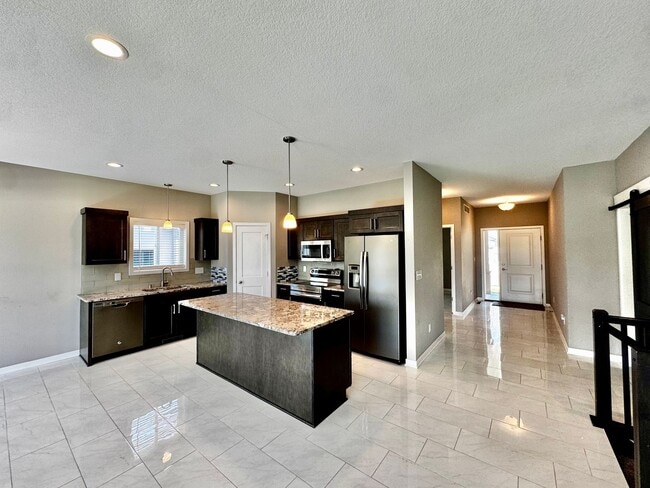 Building Photo - For Rent Beautiful 4 bedroom 3 bathroom 3 attached car garage!