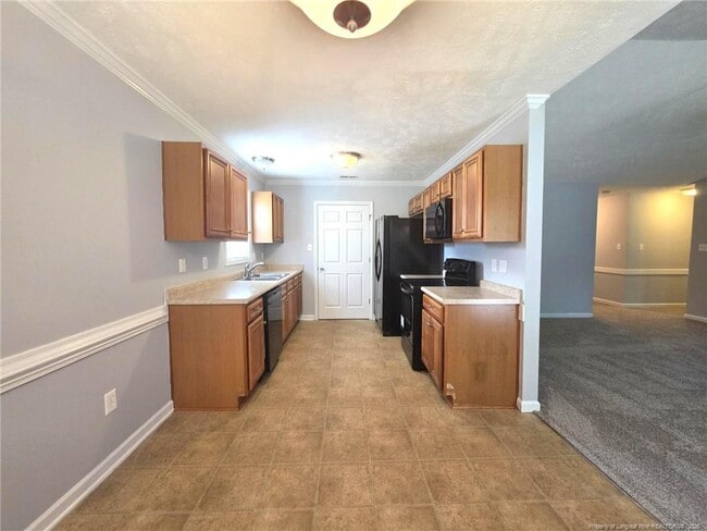 Building Photo - 6312 Firefly St