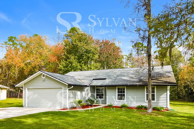 Building Photo - The living is easy in this 4 bedroom, 2 bathroom home