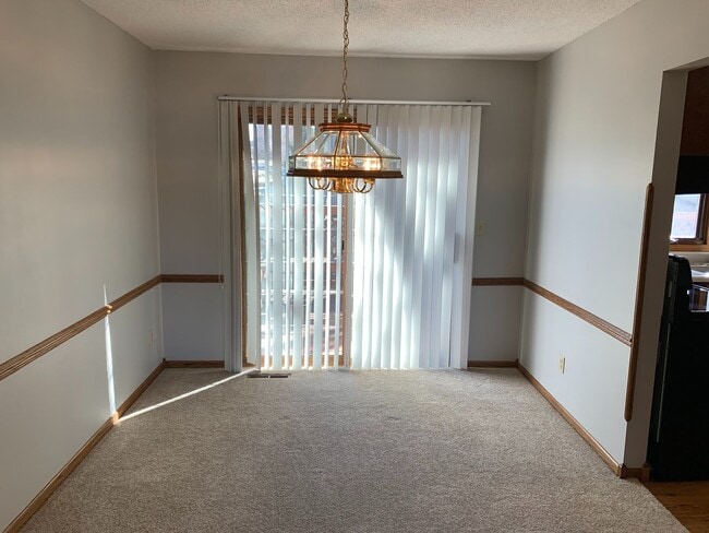 Building Photo - Elegant 4-Bedroom Split Foyer Home – West Rapid Cul-de-Sac!