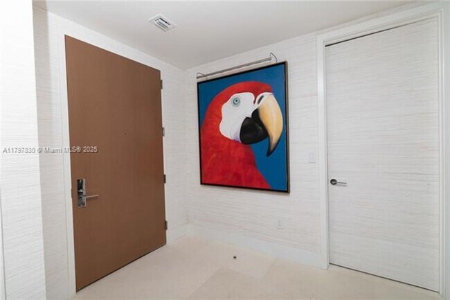 Building Photo - 10201 Collins Ave