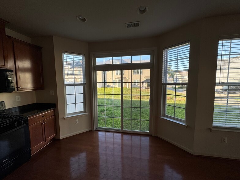 Here's the "bump out" space for a dining table. Note how far the neighbors are from you! - 44520 Gray Wolf St