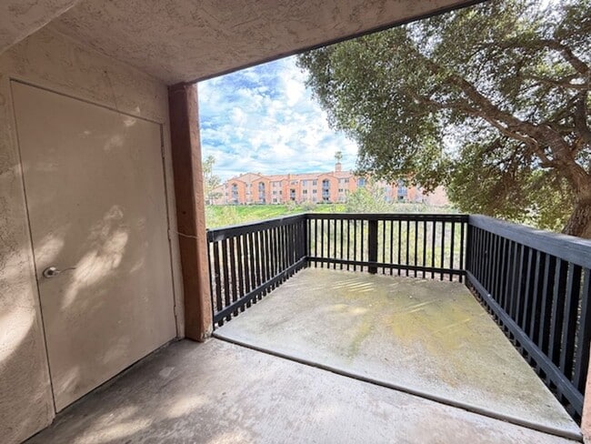 Building Photo - Resort-Style 2BR/2BA First-Floor Condo in Gated Lucera Community Near UTC