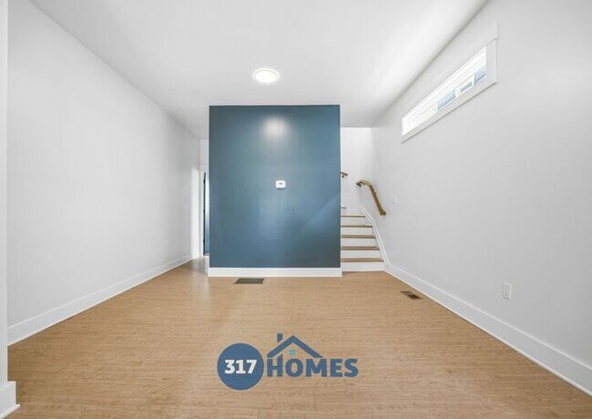 Building Photo - Spacious Four Bedroom Townhome with Main Level Suite in Holy Cross