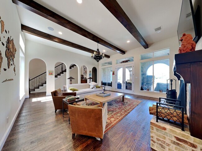 Building Photo - Experience Resort-Style Living in the Prestigious Gated Community of Bella Flora.