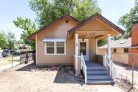 Building Photo - Charming Central Bungalow with Fenced Yard & Oversized Garage!