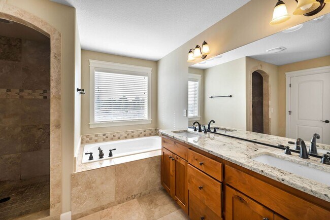 Building Photo - Beautiful Gated Fisher’s Landing Townhome with 4 Bedrooms, Gas Fireplace & Central AC