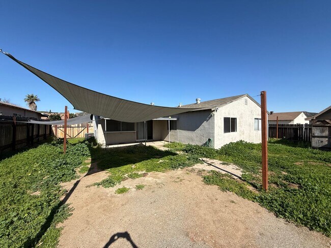 Building Photo - 4 Bedroom, 2 Bath Home with Large Yard + Two Car Garage