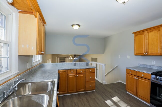 Building Photo - Move in before January 31st and choose your reward: a $250 Amazon Gift Card or a 55" Smart TV!