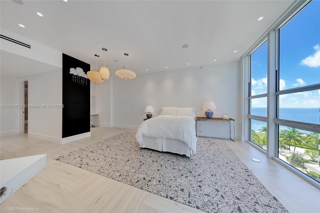 Building Photo - 10225 Collins Ave