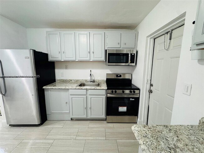 Building Photo - 631 NW 11th Ave