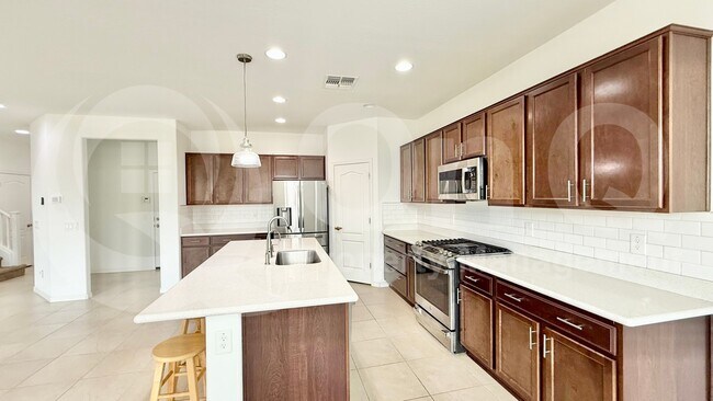Building Photo - 10935 E Tesla Ave