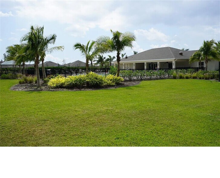 BBQ behind Amenity Center - 25152 E Lenox Cir