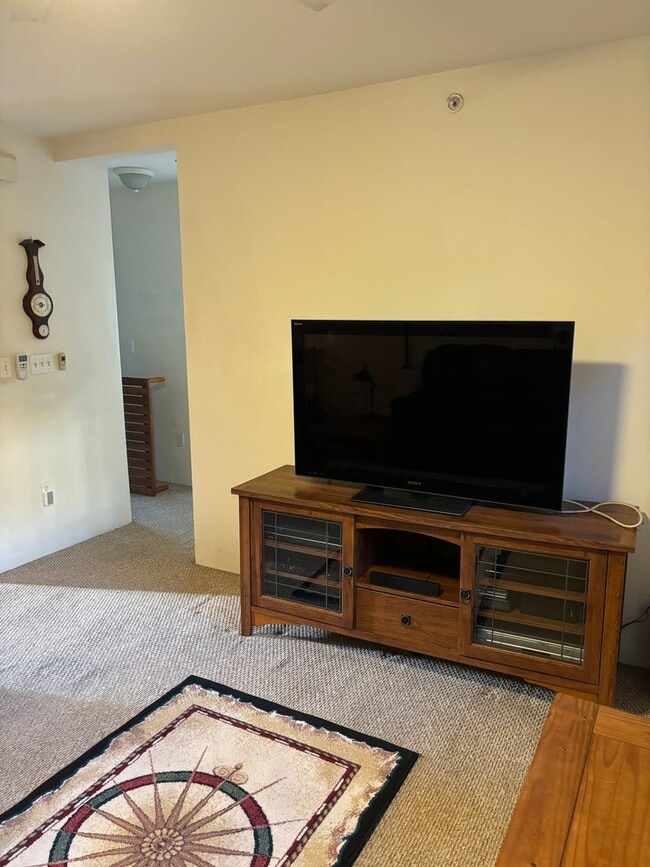 Building Photo - Move-In Ready 2BR/2BA Condo – Fully Furnished, AC, Washer/Dryer, 2 Parking stalls