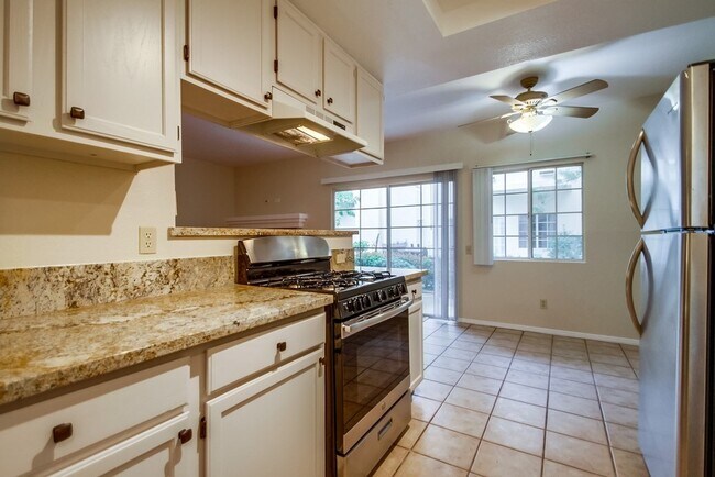 Building Photo - Spacious Townhome in San Marcos, 2-Car Garage, and a Tropical Community Pool!!