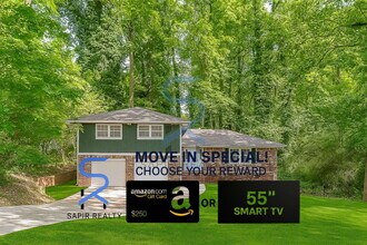 Building Photo - Move in before December 15th and choose your reward: a $250 Amazon Gift Card or a 55" Smart TV!