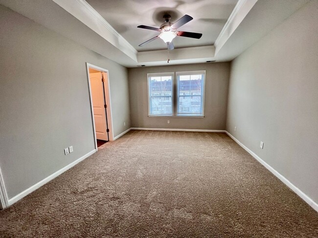 Building Photo - 3 bed/2.5 bath at end unit townhome in Berkeley Walk at Savannah Quarters with garage