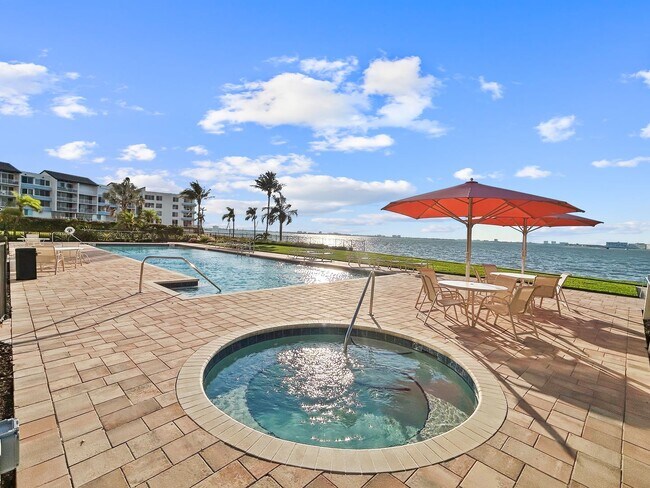 Building Photo - Luxury Waterfront Living at Bacopa Bay – Stunning 8th Floor Condo with Panoramic Views | 3beds/2....