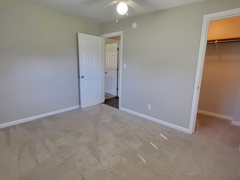 Bedroom 2 with ceiling fan and walk-in closet - 1429 Virginia Ave