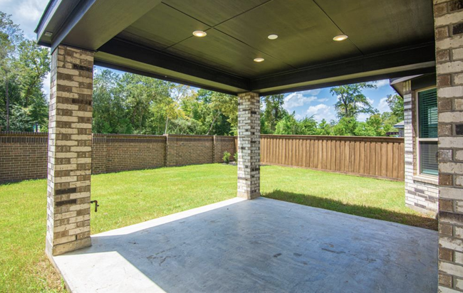 Added bonus is 3/4 of your fence is brick & has upgrades stained wood fencing - 27028 Hidden Rock Ct