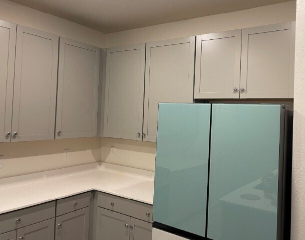 actual fridge with gray cabinets - 3574 Dimora St