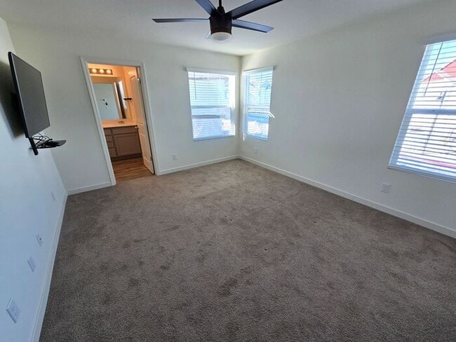 Building Photo - Modern 3-Bedroom Townhome with 2-Car Garage, Bright Interiors & Private Patio