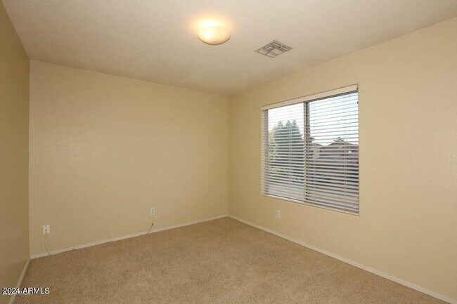 Building Photo - 7931 W Rose Garden Ln