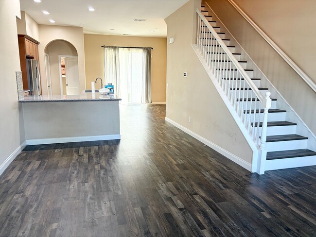 Building Photo - Stylish 3-Story Townhome with Balconies & Open-Concept Living