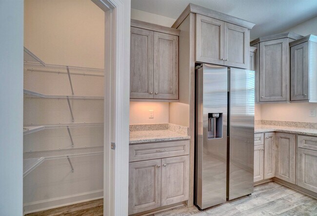 Building Photo - Available 08-05-25! Coastal Luxury Townhom...