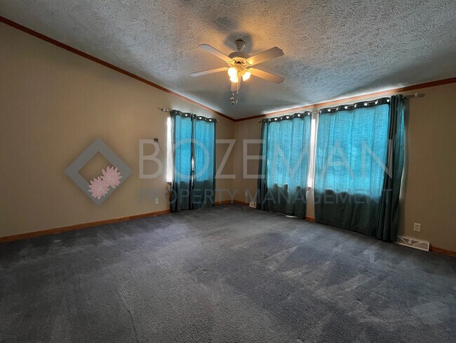 Building Photo - 6800 Bridger Canyon Dr