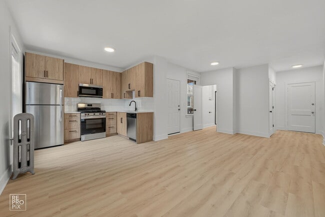 Building Photo - 6977 N Bell Ave