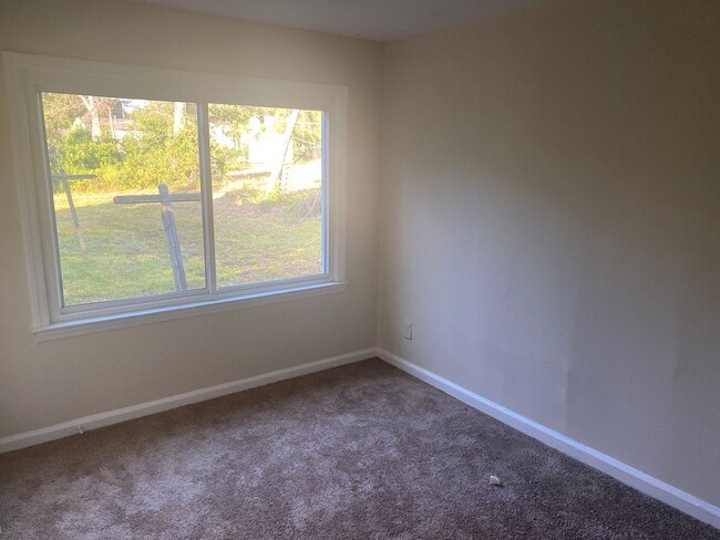 Building Photo - Stop. Drop, and Move