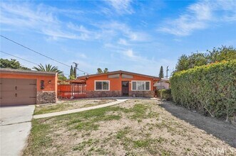 Building Photo - 9417 Mango Ave