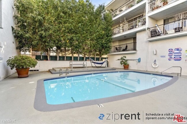 Building Photo - 1 br, 2 bath Condo - 7260 Hillside Avenue,...