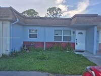 Building Photo - 407 SW Natura Ave
